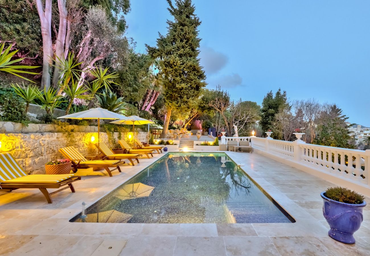 Swimming pool with deckchair