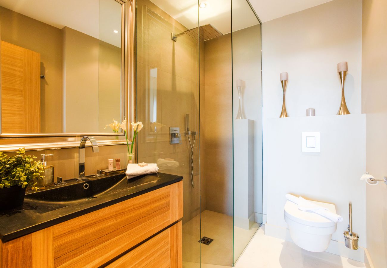 bathroom with shower and toilet